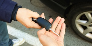Buyer taking car key